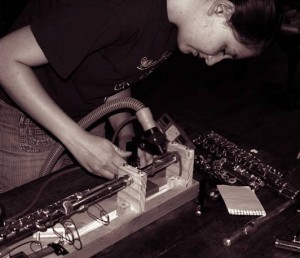 Judith Gilbert with a version of Wye’s flute player, dubbed “Trevor 3.2.”