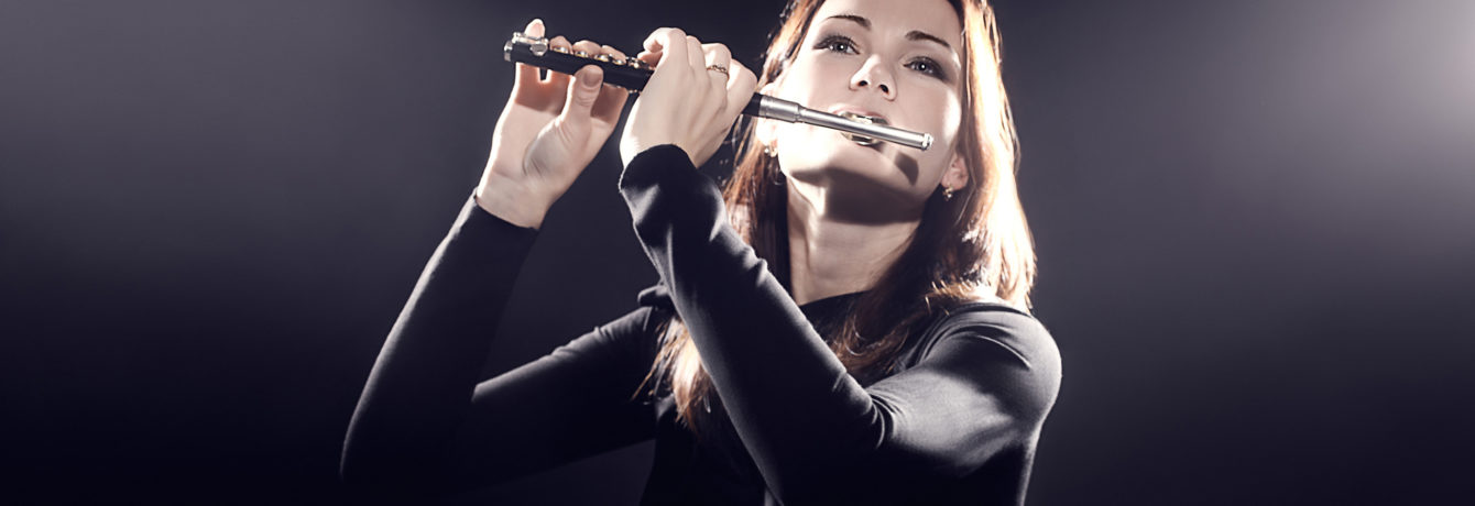 Woman playing piccolo