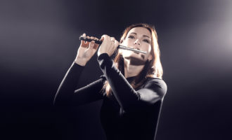 Woman playing piccolo